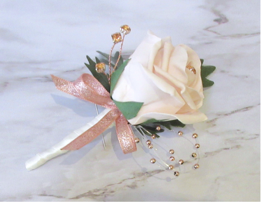 blush and rose gold buttonhole